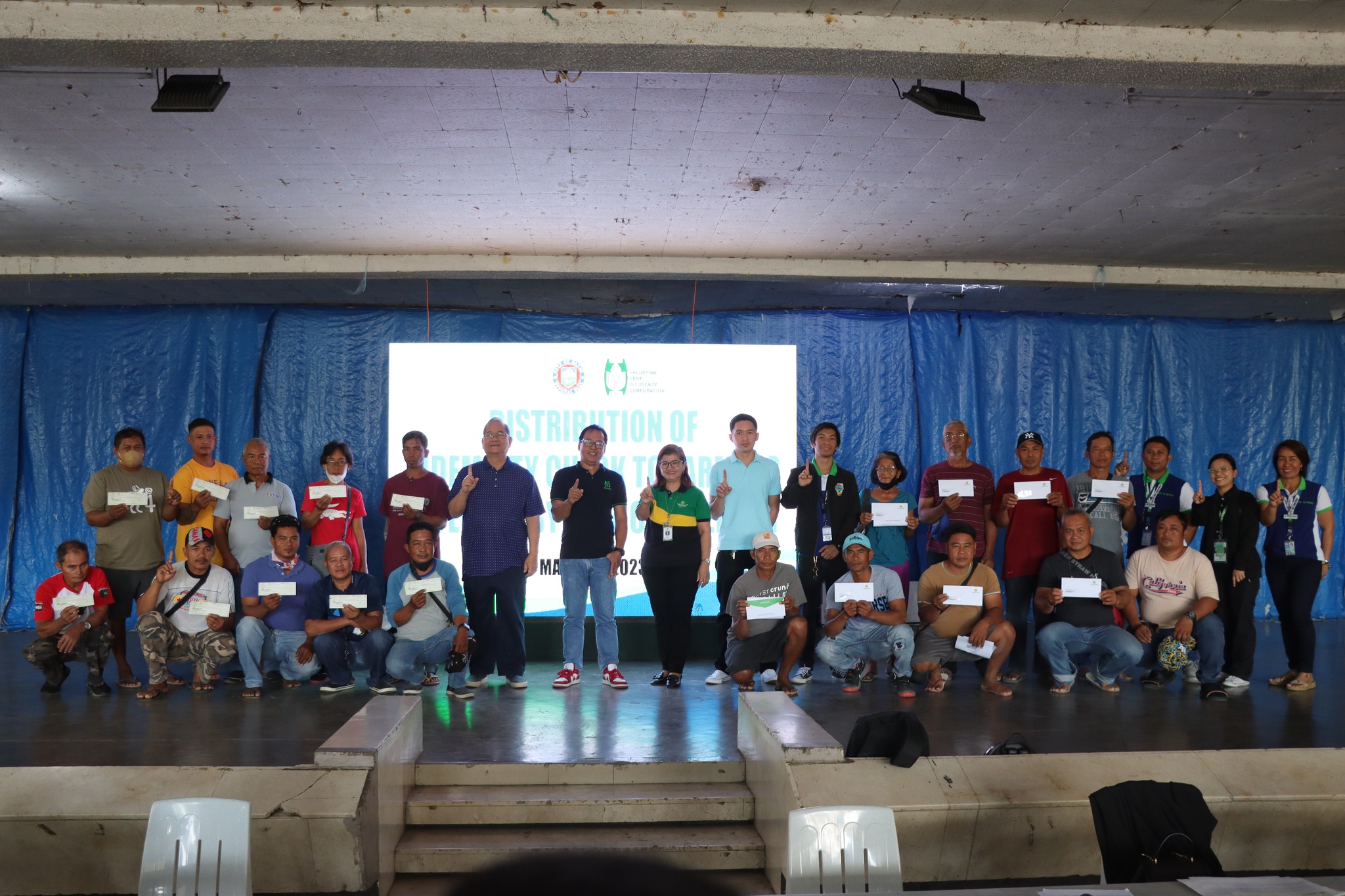 BATAC FARMERS RECEIVE INDEMNITY CHECKS FROM PCIC